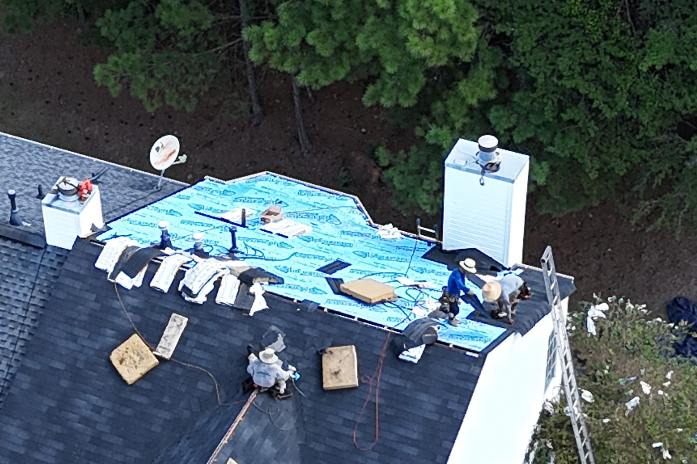 RoofMax USA crew installing a new asphalt shingle roof on a metro Atlanta home